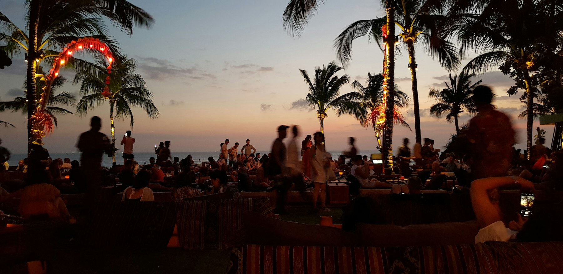 Beach club party at sunset